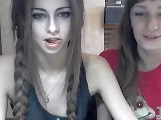 Young girlfriends posing on webcam